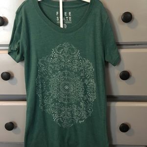 Sea green T-shirt with print on it